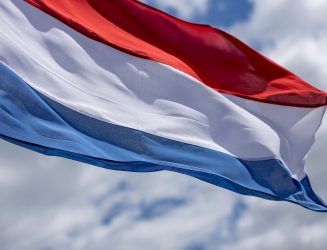 Waving Dutch red, white and blue national flag